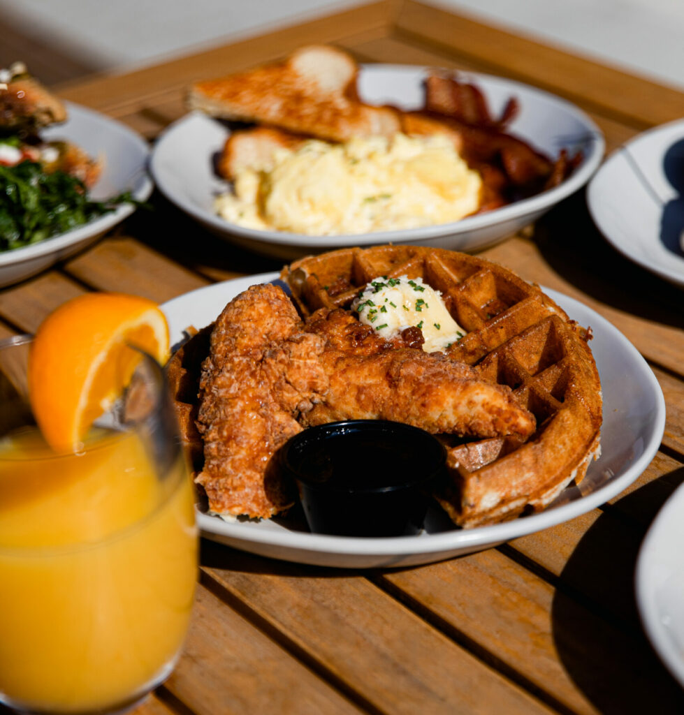 Brunch food on plates on our outside patio