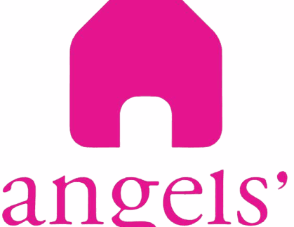 A pink logo featuring a simple house shape with a halo above it symbolizes giveback. Below the house, the words “angels’ arms” are written in lowercase letters, “angels’” underlined, benefiting vets and supporting youth.