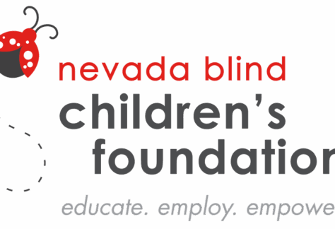Logo for the Nevada Blind Children’s Foundation with a dotted line ladybug graphic and the words: “nevada blind children’s foundation. educate. employ. empower.” in red and grey text, giveback benefiting youth in our community.