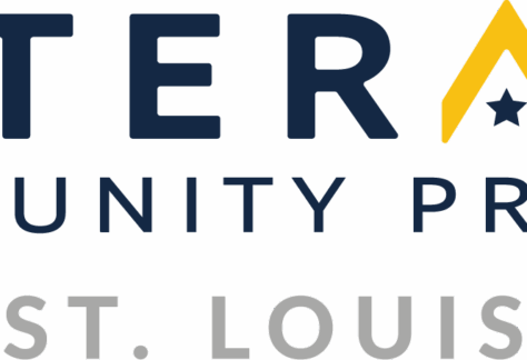 Logo for Veterans Community Project St. Louis, benefiting vets and supporting youth. The word VETERANS is written in bold navy letters, with the A stylized in gold and a star inside it. Community Project and St. Louis are below in smaller text.