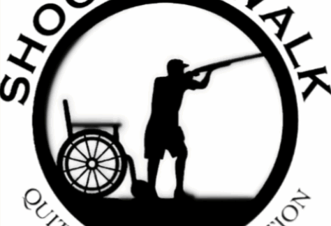 A silhouette of a person aiming a shotgun stands next to an empty wheelchair. The text above reads SHOOT TO WALK and below, QUITTING IS NOT AN OPTION.