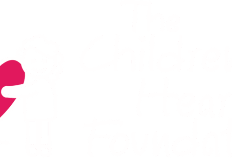 Two cartoon children holding a large red heart, with the words The Childrens Heart Foundation written in white text to the right, highlighting a giveback benefiting youth.
