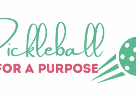 Logo with the words Pickleball for a Purpose in green and pink, next to a green pickleball with white holes and motion lines, suggesting movement.