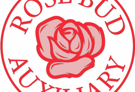 A circular red logo with the words ROSE BUD AUXILIARY around the edge and a stylized rose illustration in the center, symbolizing a giveback initiative benefiting vets and supporting youth programs.