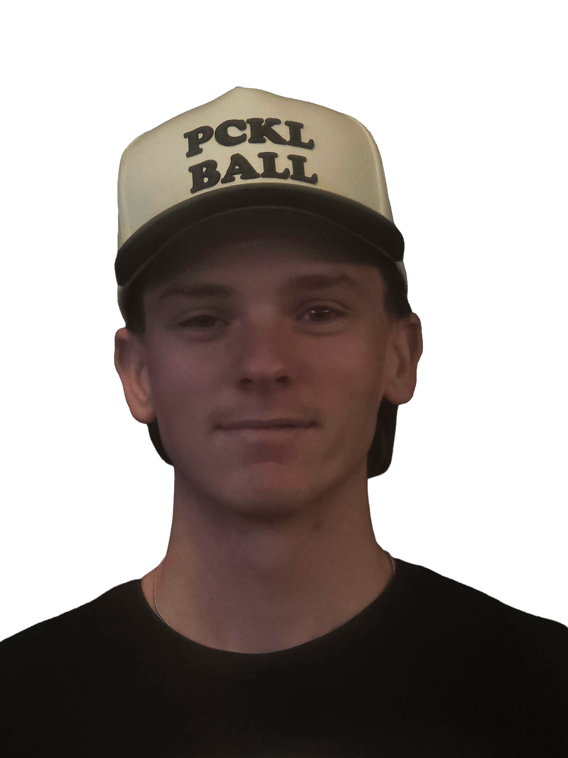 A young person wearing a white and black cap with PCKL BALL written on it, and a black shirt, is facing the camera against a plain white background.