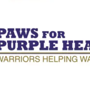 Logo featuring a purple medal with a paw print and the text PAWS FOR PURPLE HEART in bold purple letters above WARRIORS HELPING WARRIORS in gold.