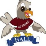 Cartoon hawk wearing a maroon T-shirt that says GO HAWKS! stands on a blue banner labeled HALL, wings spread wide in happiness. This image celebrates our Giveback Benefiting Vets for Youth initiative.
