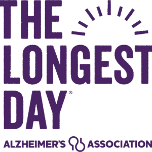 The image features the text The Longest Day with a sun graphic, and Alzheimer's Association below, representing a giveback awareness event benefiting vets and youth. The text and graphics are in purple.