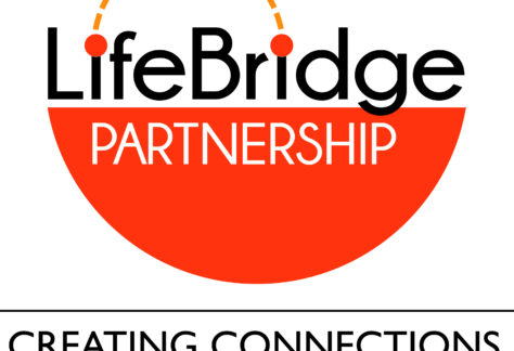 Logo for LifeBridge Partnership featuring a large red semicircle, LifeBridge in black text with two orange dots connected by a dashed arc, PARTNERSHIP in white on red, and the slogan: CREATING CONNECTIONS, ENRICHING LIVES—benefiting vets for youth.
