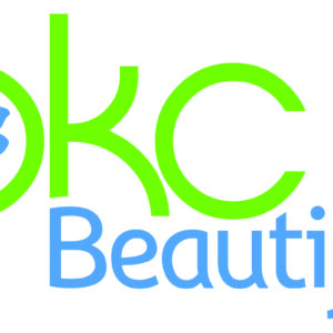 Logo with bright green letters OKC and a blue flower inside the O. The word Beautiful appears below in light blue, highlighting its Giveback mission benefiting Vets for Youth.