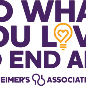 Purple text reads Do what you love to end ALZ. The O in love is a yellow light bulb with a heart inside. Alzheimers Association appears at the bottom with a key-shaped logo, Benefiting Vets for Youth through this meaningful giveback initiative.