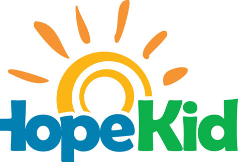 HopeKids logo with Hope in blue and Kids in green. An orange sun with rays rises behind the text, symbolizing positivity—perfect for events like the 10% Giveback Night at Chicken N Pickle NKC.