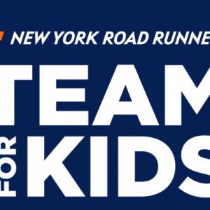 Logo with the text New York Road Runners above bold white words Team for Kids on a dark blue background, featuring an orange graphic element in the top left corner celebrating 500 Projects of Love Giveback Night.