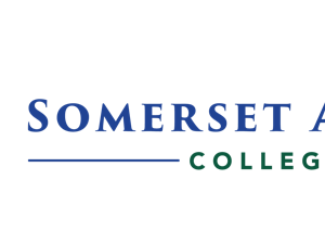 Somerset Academy Collegiate logo featuring a blue and green shield with an open book, laurel wreath, and torch, alongside the school name and the motto Excellence in Education.