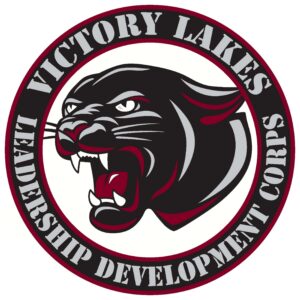 Logo of a roaring black panther head inside a circle. Around it, text reads Victory Lakes Leadership Development Corps in bold, capital letters.