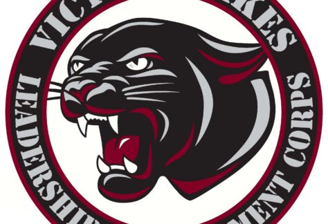 Logo of a roaring black panther head inside a circle. Around it, text reads Victory Lakes Leadership Development Corps in bold, capital letters.