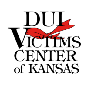 Logo for DUI Victims Center of Kansas with a red ribbon integrated into the letter V in Victims against a white background.