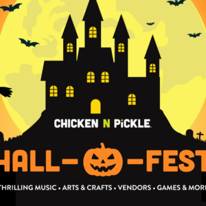 Halloween event poster with a haunted house, flying witch, bats, gravestones, and a large yellow moon. Text: Chicken N Pickle Hall-Fest. Thrilling music, arts & crafts, vendors, games & more!.