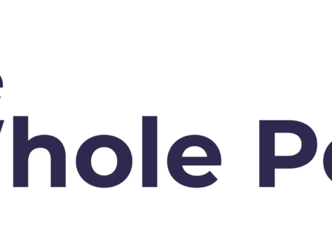 The Whole Person logo featuring a stylized figure embracing a heart, displayed for the 10% Giveback Night at Chicken N Pickle NKC.